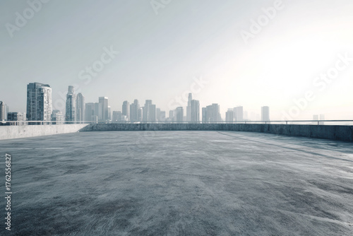 A minimal concrete rooftop helipad with panoramic view of a modern skyline under soft morning light, ideal for automotive or corporate advertising backgrounds.