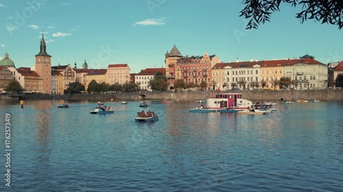 View on Vltava river in Prague with boats in summer 