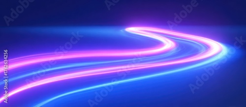 Abstract neon light trails on blue background.