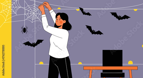 Woman Decorating Halloween Decorations Focused on the Main Subject.