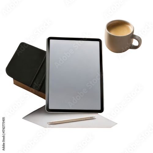 A tablet with a blank screen sits next to a notebook, pencil, and mug of coffee.