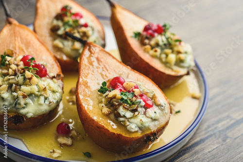 Delicious baked pears with nuts, blue cheese, thyme, cranberry and honey
