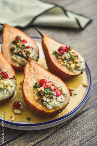 Delicious baked pears with nuts, blue cheese, thyme, cranberry and honey