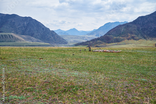 Ancient burials in the Altai mountains on terrace of the Katun and Bolshoy Yaloman rivers.