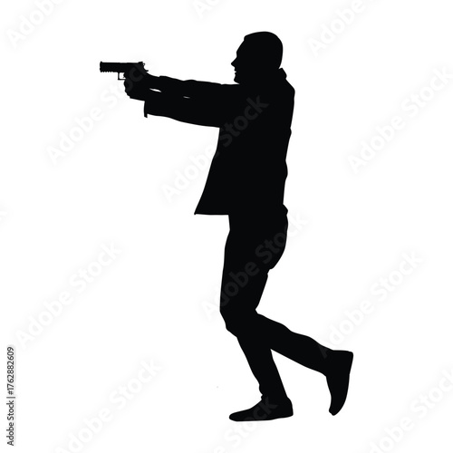 Photos Silhouette of Man Pointing a Handgun or Pistol with Both Hands, Aiming and Firin