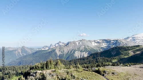 A camera pan showing a place with few vegetation and glaciers in Mount Rainier National Park.USA, Washington july 17 2025.