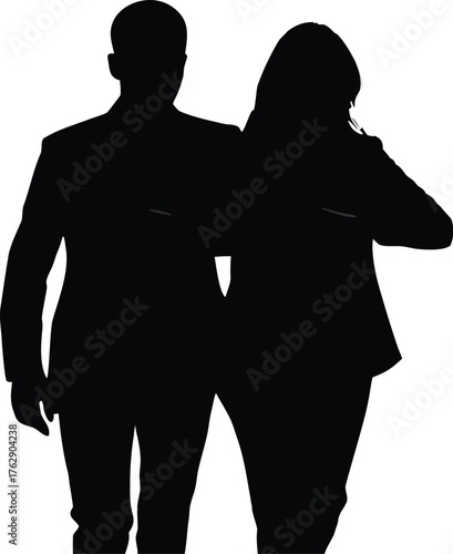 Silhouetted couple standing