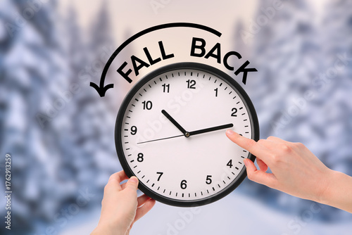 Clock shows time adjustment with hands indicating two o'clock