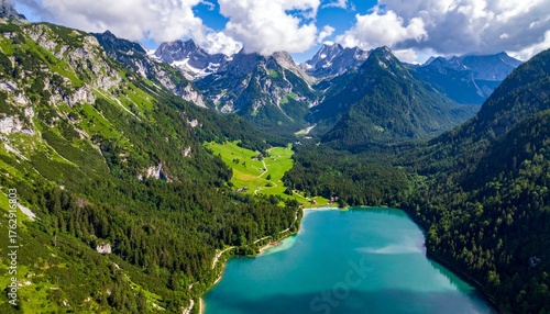 Turquoise mountain lake with village in Austrian Alps
