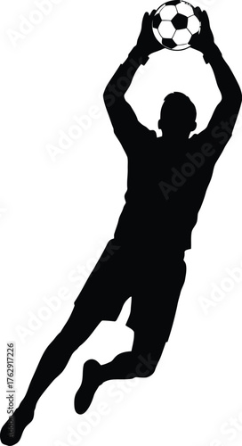 Black silhouette of a soccer goalkeeper catching a ball football goalie