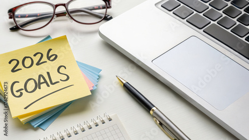 2026 new year goals happy end planning notebook pen laptop glasses