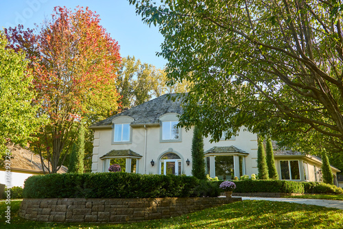 Exterior of modern home on a fall day with leaves starting to change color