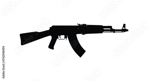 A stark black silhouette of an ak 47 assault rifle on a clean white background symbolizing power and conflict silhouette