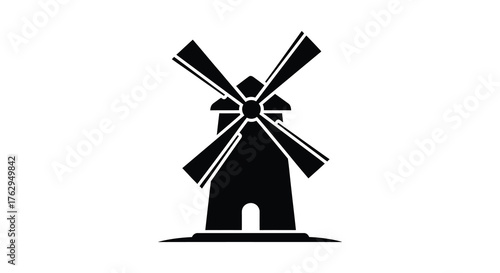 A classic dutch windmill depicted as a bold black silhouette against a stark white background symbolizing history and rural life silhouette