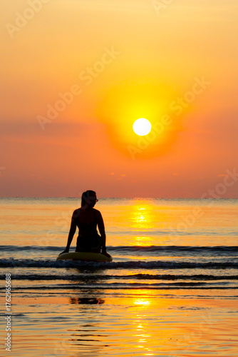 Wallpaper Mural Woman with sunrise and silhouette Torontodigital.ca