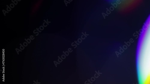 Multicolored light leaks footage on black background, lens flare leak burst overlays transitions 4k resolutions for editing film