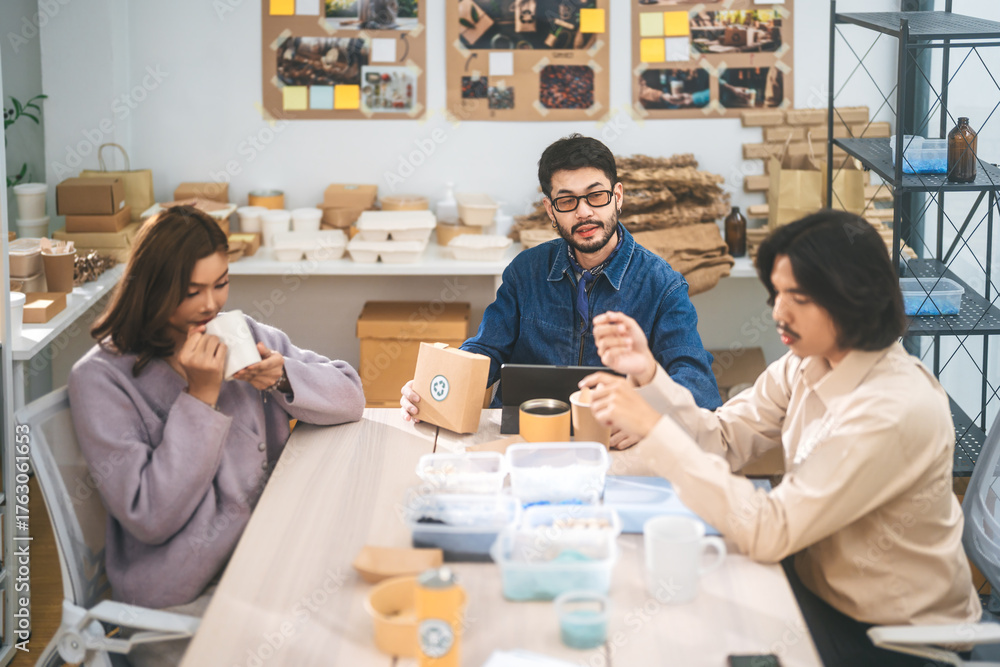 © dodotone - Asian teamwork business meeting diverse people working at indoor office