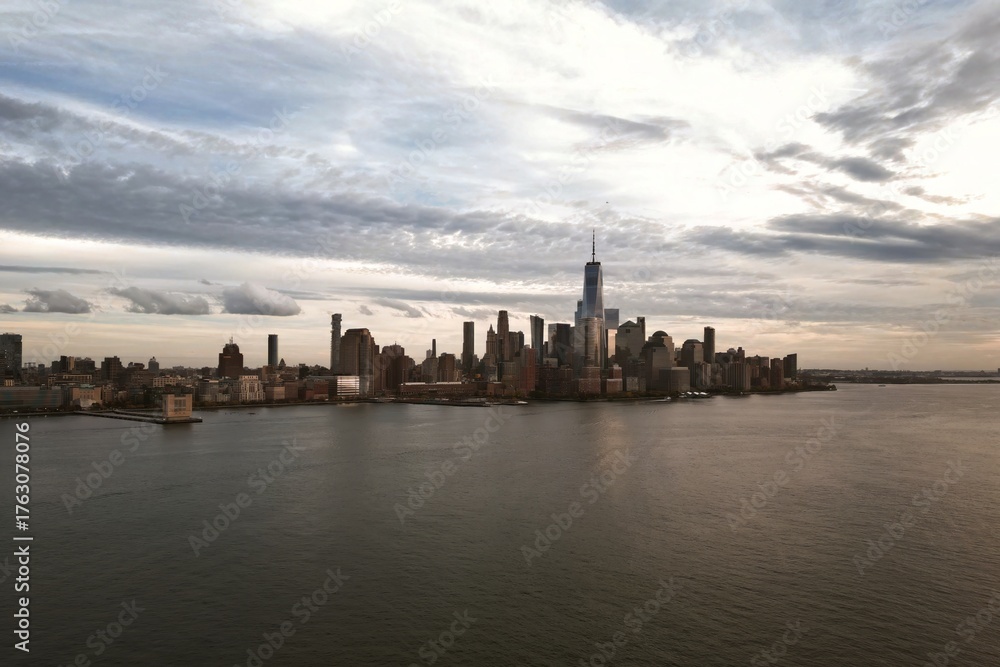 Fototapeta premium New York skyline landmarks skyscrapers. Travel to America. New York USA. View of Manhattan in New York. New York City USA midtown Manhattan financial district skyline. NYC from drone. NYC aerial view.