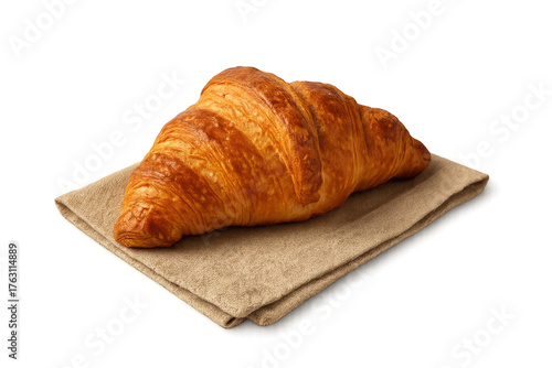 Traditional buttery croissant pastry on napkin, transparent background