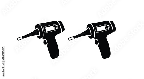 Two black infrared thermometers displayed side by side on a white background