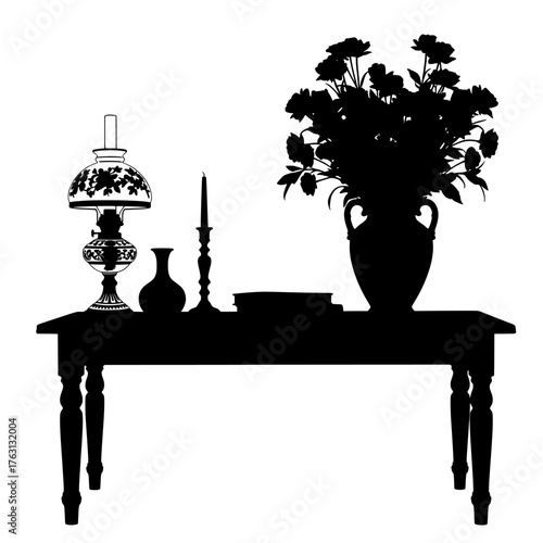 Silhouette of an antique wooden table displaying a vintage oil lamp a decorative vase with flowers a book and a candlestick