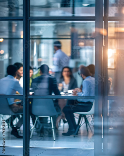 Group of business executives in boardroom discussing strategy and planning projects, symbolizing leadership, teamwork, cooperation, and innovation in modern corporate environment
