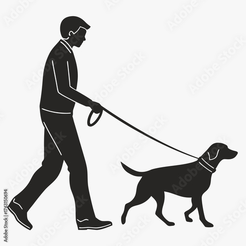 Silhouette of a man walking a dog