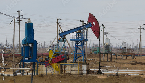 Oil pumping rigs are located at the Zhanauzen oil field in Kazakhstan.