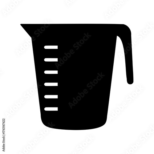 Black silhouette of a measuring cup on a white background isolated