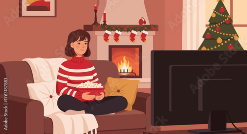 Young woman enjoying a cozy Christmas movie night at home.