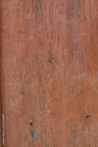 Close up of rustic brown wooden texture featuring detailed grain patterns and natural imperfections. Ideal for backgrounds, design elements, or vintage decorative surfaces with organic character.