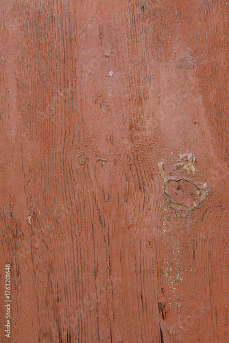 Close up of rustic brown wooden texture featuring detailed grain patterns and natural imperfections. Ideal for backgrounds, design elements, or vintage decorative surfaces with organic character.