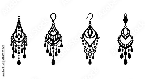 Elegant collection of intricate black silhouette chandelier earrings and dangle drop jewelry accessories for fashion and design projects isolated on white background