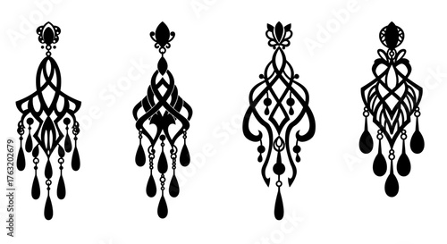Collection of four elegant ornate black chandelier earrings showcasing intricate detailed designs perfect for fashion jewelry design projects isolated on white background