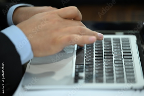 typing on laptop