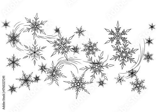 Collection of intricate, hand-drawn snowflakes. Black and white vector line art of a snow flurry, perfect for a winter or Christmas background.