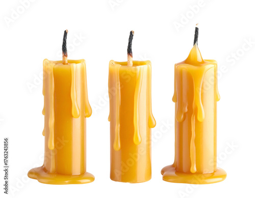 Three extinguished candles, with dripping wax, isolated on a black background