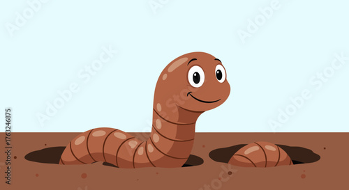 Happy earthworm emerging from the soil smiling and looking.