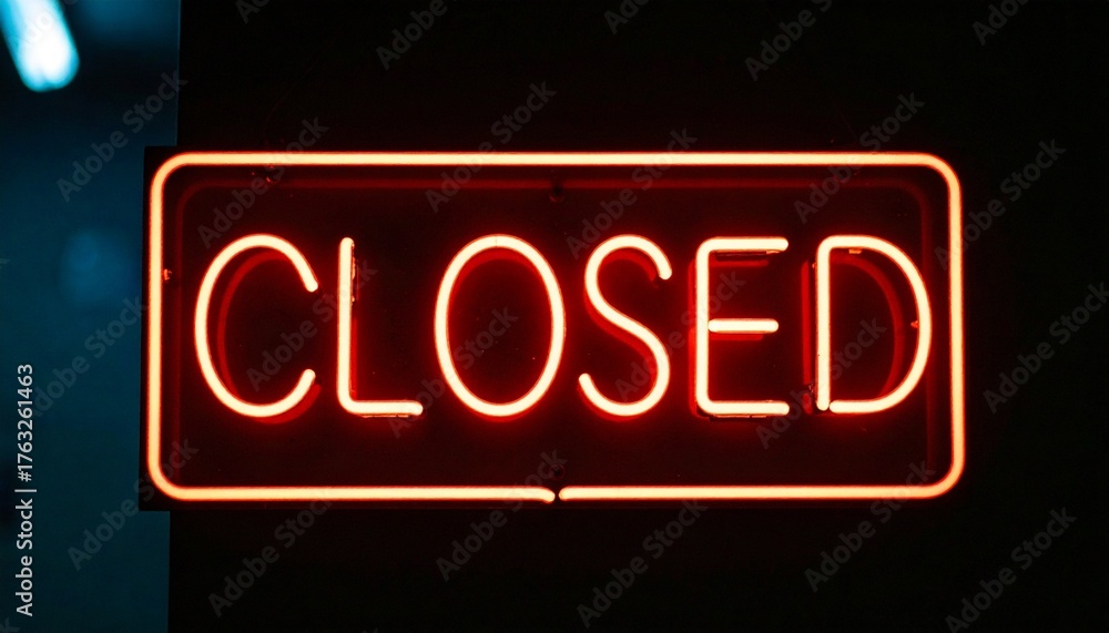 Fototapeta premium A vibrant neon sign that boldly displays the word CLOSED 