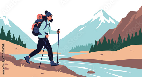 Woman hiking with backpack and trekking poles along river.