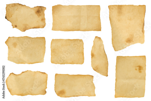 Vintage torn burnt paper scraps set isolated on transparent background, old aged pieces of ripped parchment texture collection