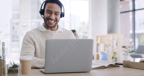 Happy, businessman and agent with headset on laptop for online advice or customer service in office. Man, employee or consultant with smile on computer for virtual assistance or support in workplace