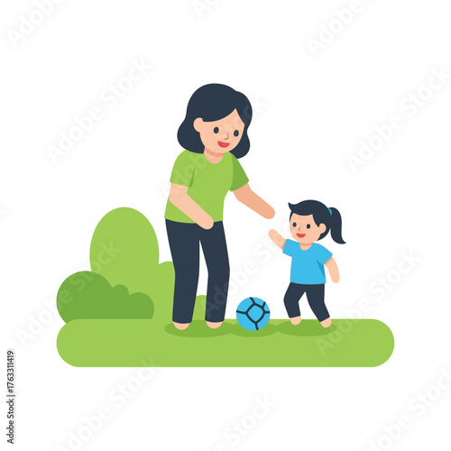 Happy mother and daughter playing soccer together in the park today