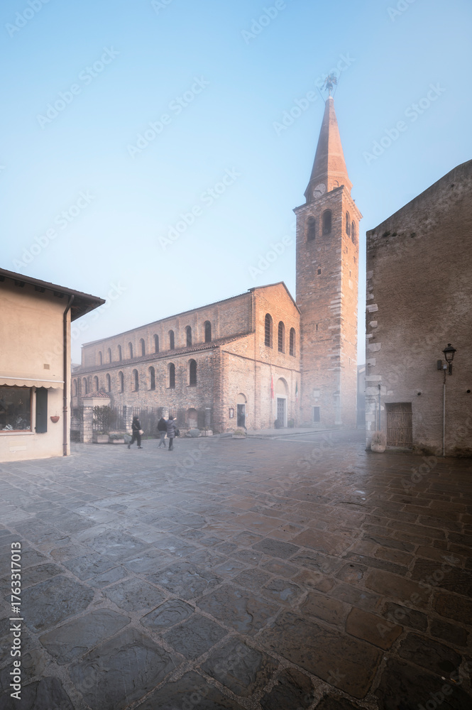 Fototapeta premium Between ancient history, art, and nature. The island of Grado in winter. The village and the sea. Friuli
