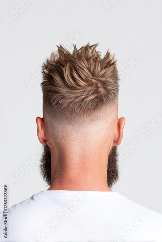 Stylish Men's Haircut with Spiky Top and Fade Back View