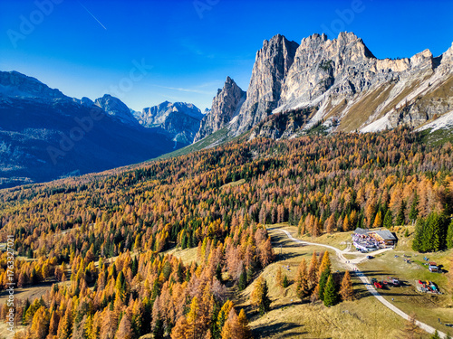 Autumn in the Dolomites. The woods and mountains above Cortina d'Ampezzo seen from above.