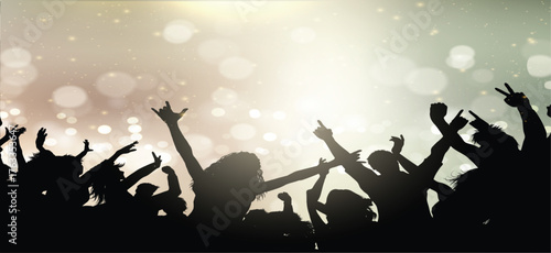 party crowd on bokeh lights background 