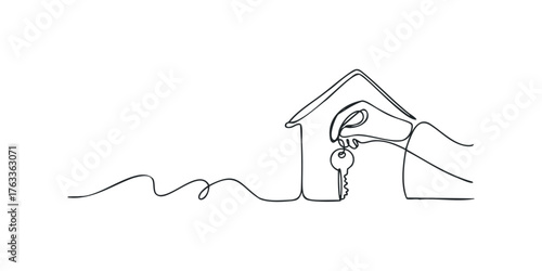 Hand holding key to house silhouette