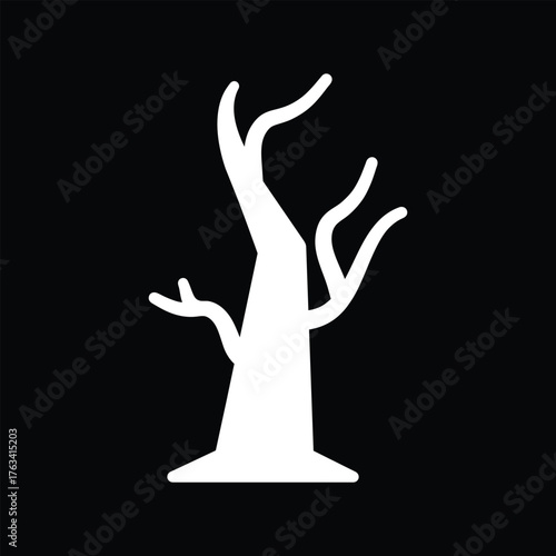Dead tree silhouette on black background