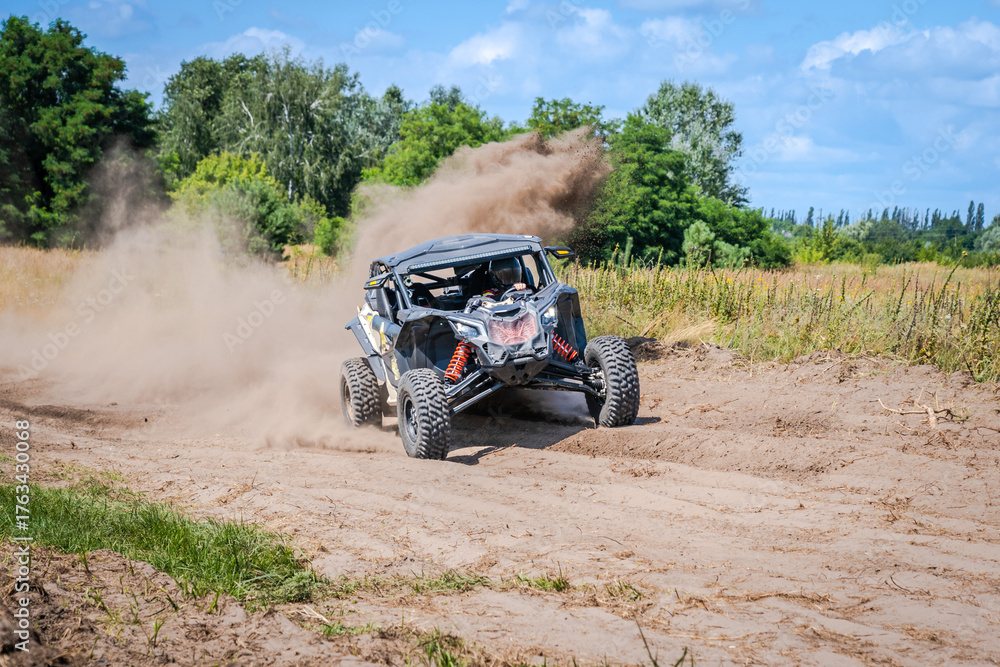 Fototapeta premium Cool view on hard ride UTV, ATV, 4x4 in sandy road